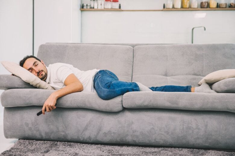 Man Sleeping on Couch